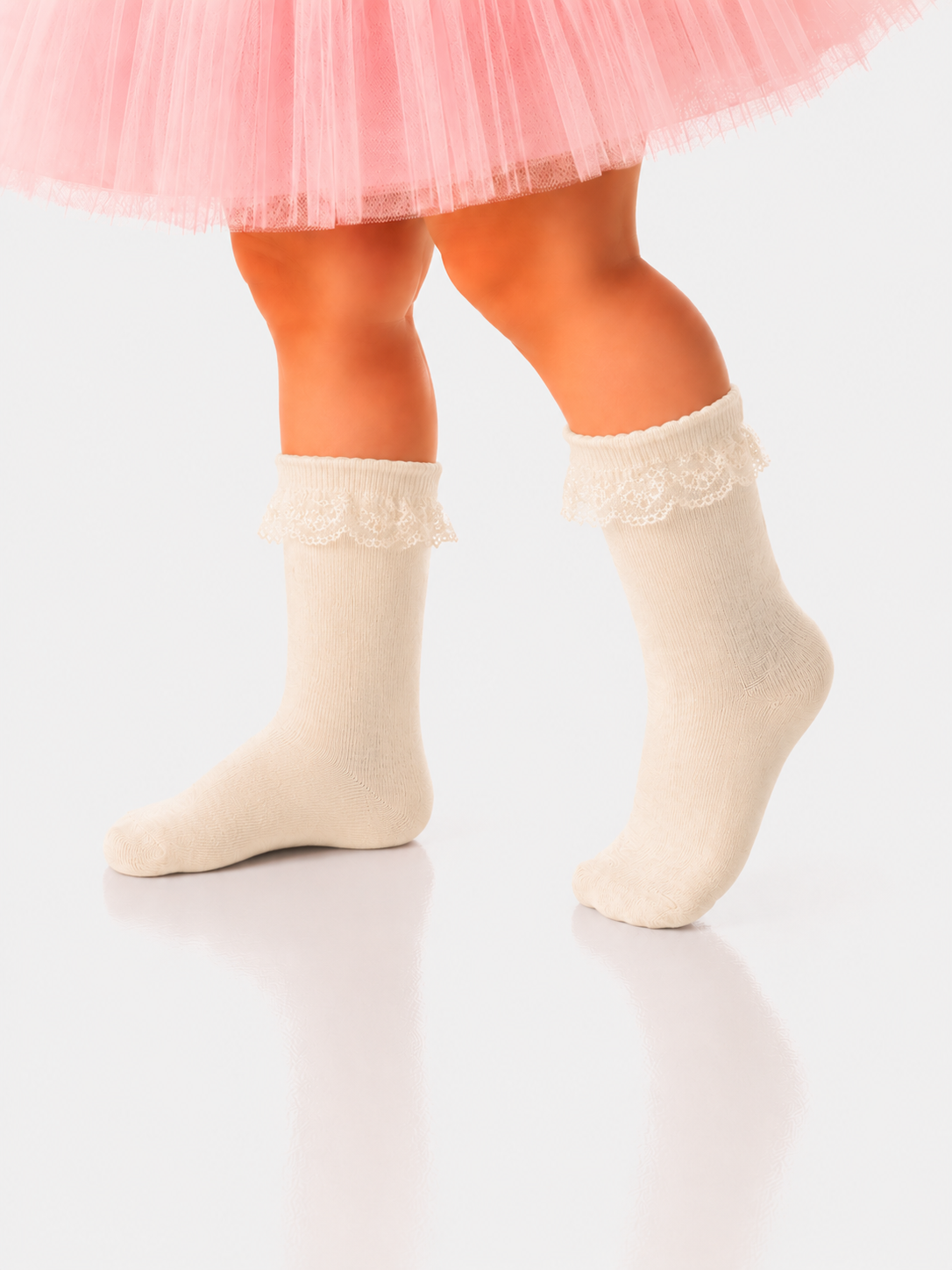 Lange Socken in Creme mit Rüschen Strümpfe